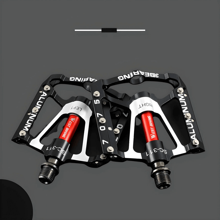 Letmetal cykelpedaler med skridsikkert greb monteret på en cykel