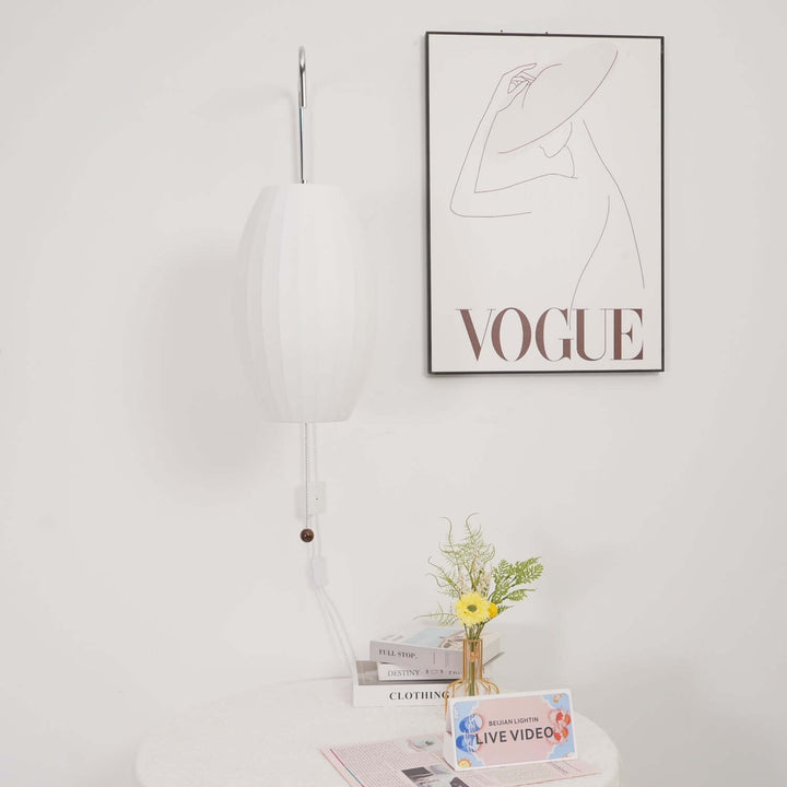 Moderne væglampe med kugledesign og varmt hvidt lys