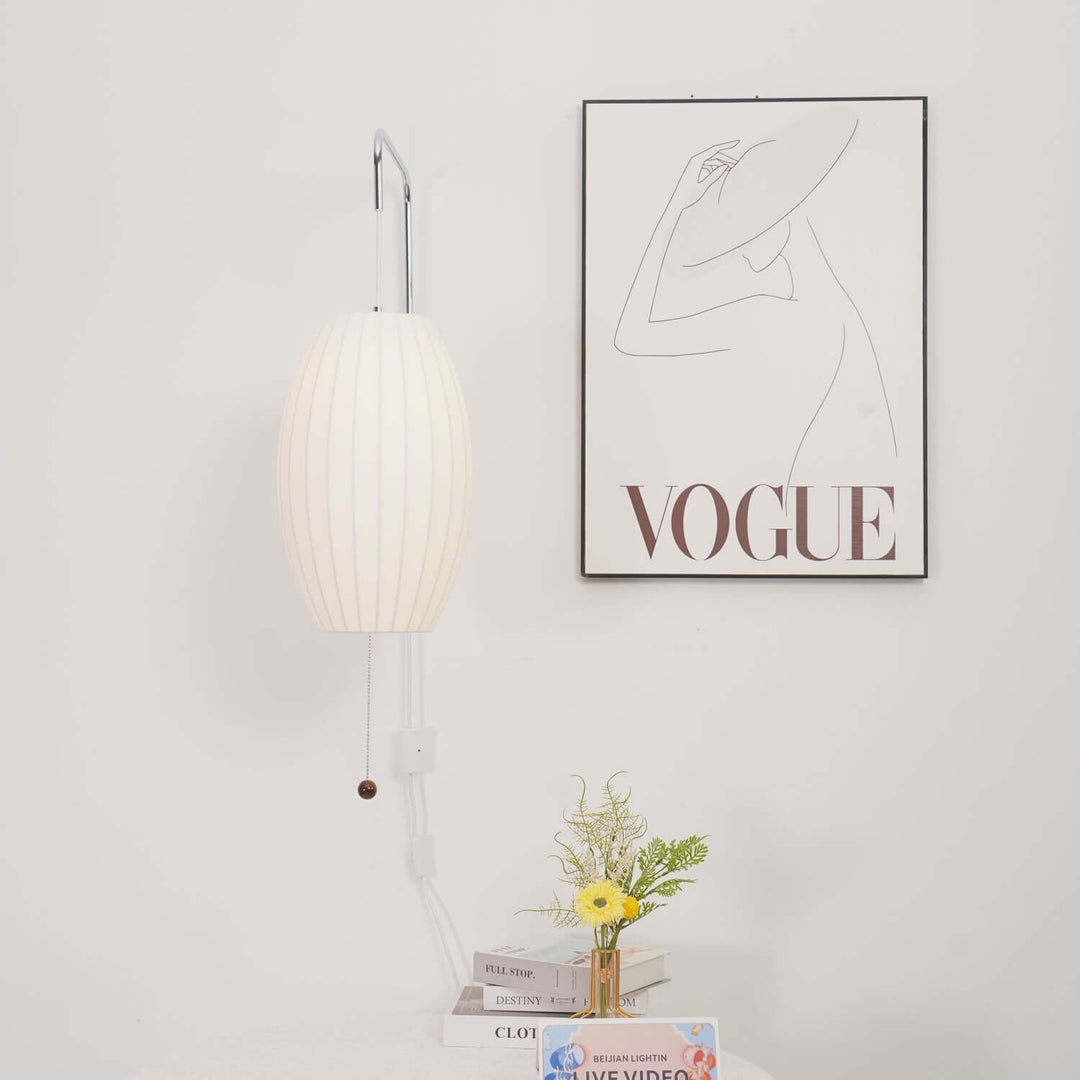 Moderne væglampe med kugledesign og varmt hvidt lys