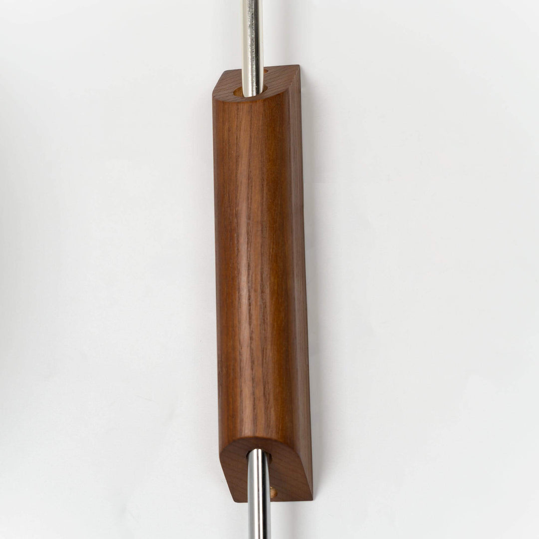 Moderne væglampe med kugledesign og varmt hvidt lys