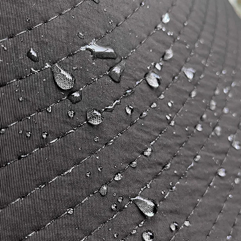 Kvinders UV-beskyttelseshat med bred skygge, foldbar, i sort, beige, khaki eller blå til udendørs aktiviteter.