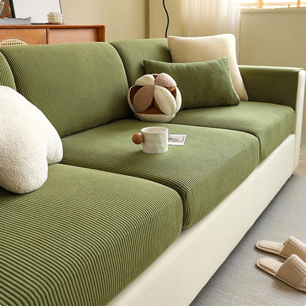 Elastisk fløjls-sofabetræk med elegante lodrette striber, passer til moderne stuer.