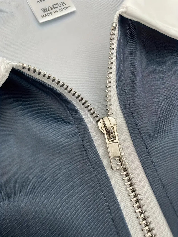 Herre golfpolo med V-hals, åndbart materiale, stilfuld og komfortabel, perfekt pasform til golfspillere.