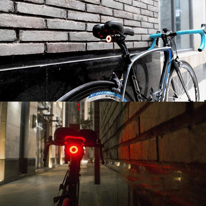 Højlyskende USB baglygte i aluminium med LED-COB og EnSca-linse, kompakt og vejrbestandig til cykler.