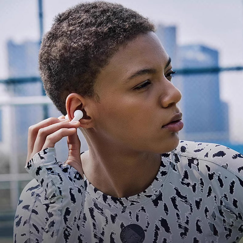 Trådløst Bluetooth sportshovedsæt, ergonomisk, vandtæt, sort eller hvid, ideel til træning og lydoplevelse