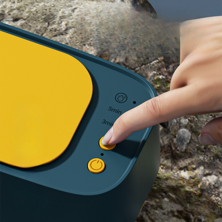 Kompakt ultralydsrenser i blå-gul til effektiv rengøring af smykker, ure og briller.