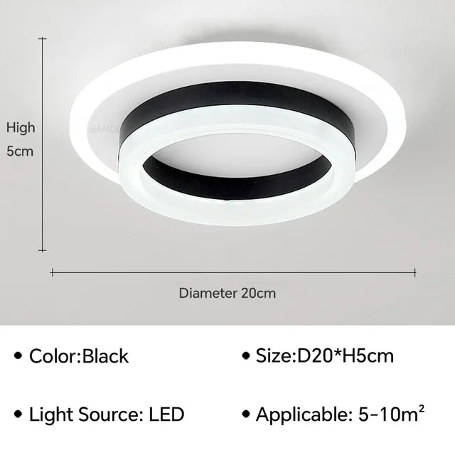 Minimalistisk moderne loftslys med rene linjer i akryl og metal, ideel til elegant rumbelysning.