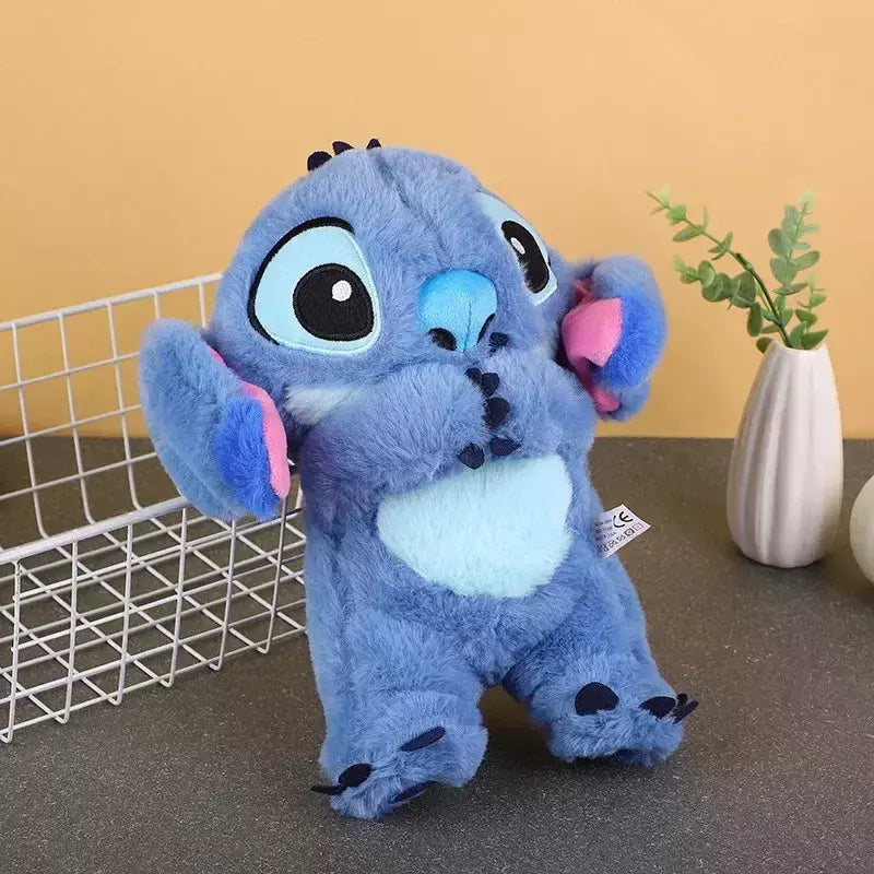 Stitch plyslegetøj med lys og musik til beroligende søvn og Disney-fans.