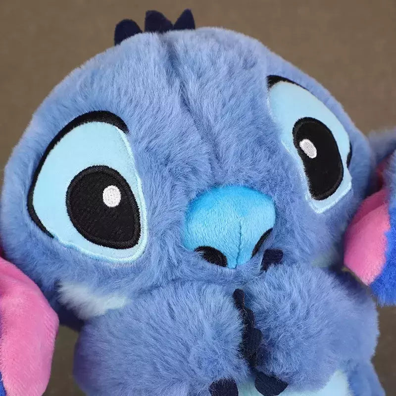 Stitch plyslegetøj med lys og musik til beroligende søvn og Disney-fans.