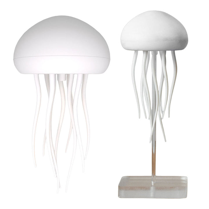 Meduse natlampe med justerbar belysning, blide farver og medusebevægelse, der skaber en afslappende havstemning.