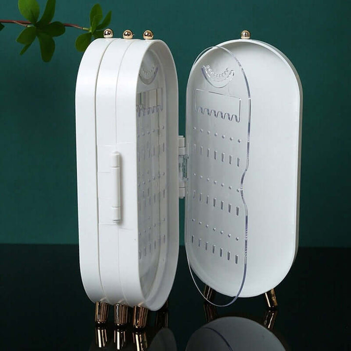 Sammenklappelig oval smykkeholder med spejl