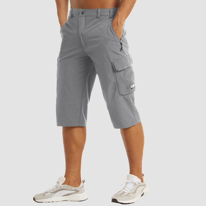 Hurtigtørrende cargo shorts til mænd, lette, med cargolommer og elastisk linning, ideelle til udendørsaktiviteter og rejser.
