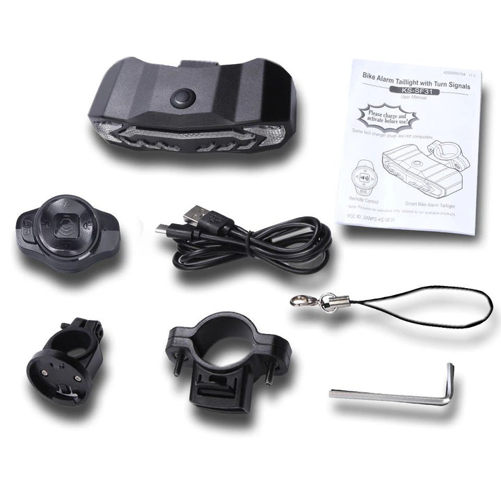 Sort baglygte med 31 LED og 6 tilstande monteret på cykelsadel, med integreret tyverialarm for øget sikkerhed.