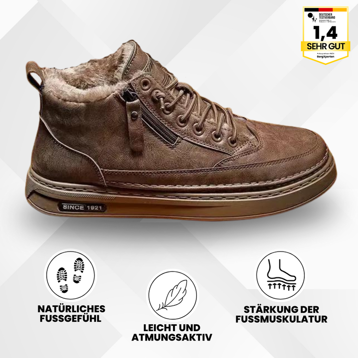 Termiske komfortsko med ergonomisk design, kuldebeskyttelse ned til -20°C, ideelle til camping og vandring, i brun og sort.
