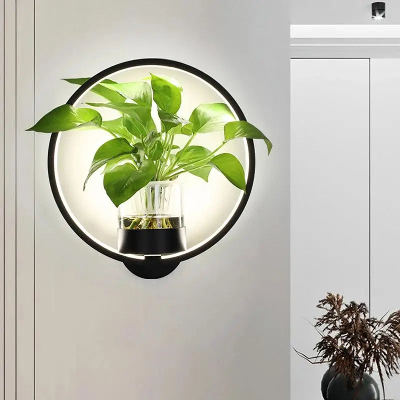 Elegant LuminaireSconce plantevæglampe i glas med naturligt design, perfekt til stilfulde interiører, oplyst med koldt eller varmt hvidt lys.
